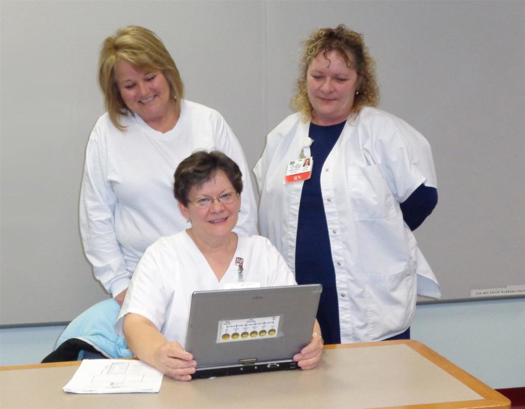 Standing are Clearfield Nurses Vicki Lansberry, RN, on left, and Linda Weitoish, RN, on right