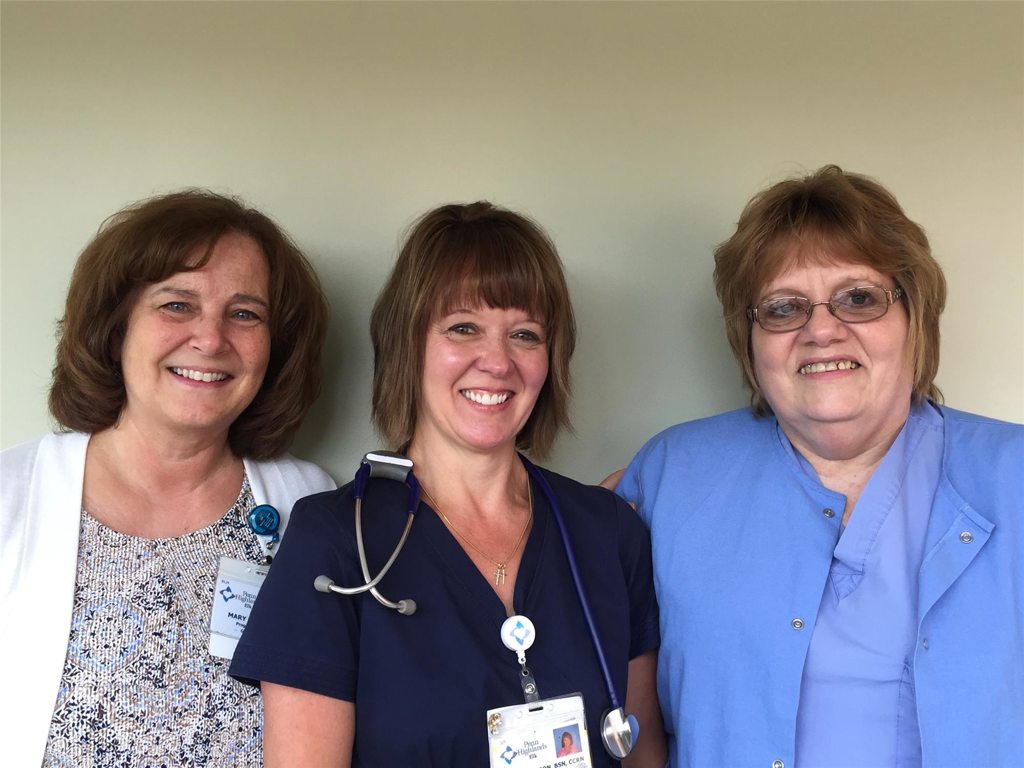 Debbie (center) is congratulated by nurse managers Mary Helen Coroso and Teddi Mackcoviak.
