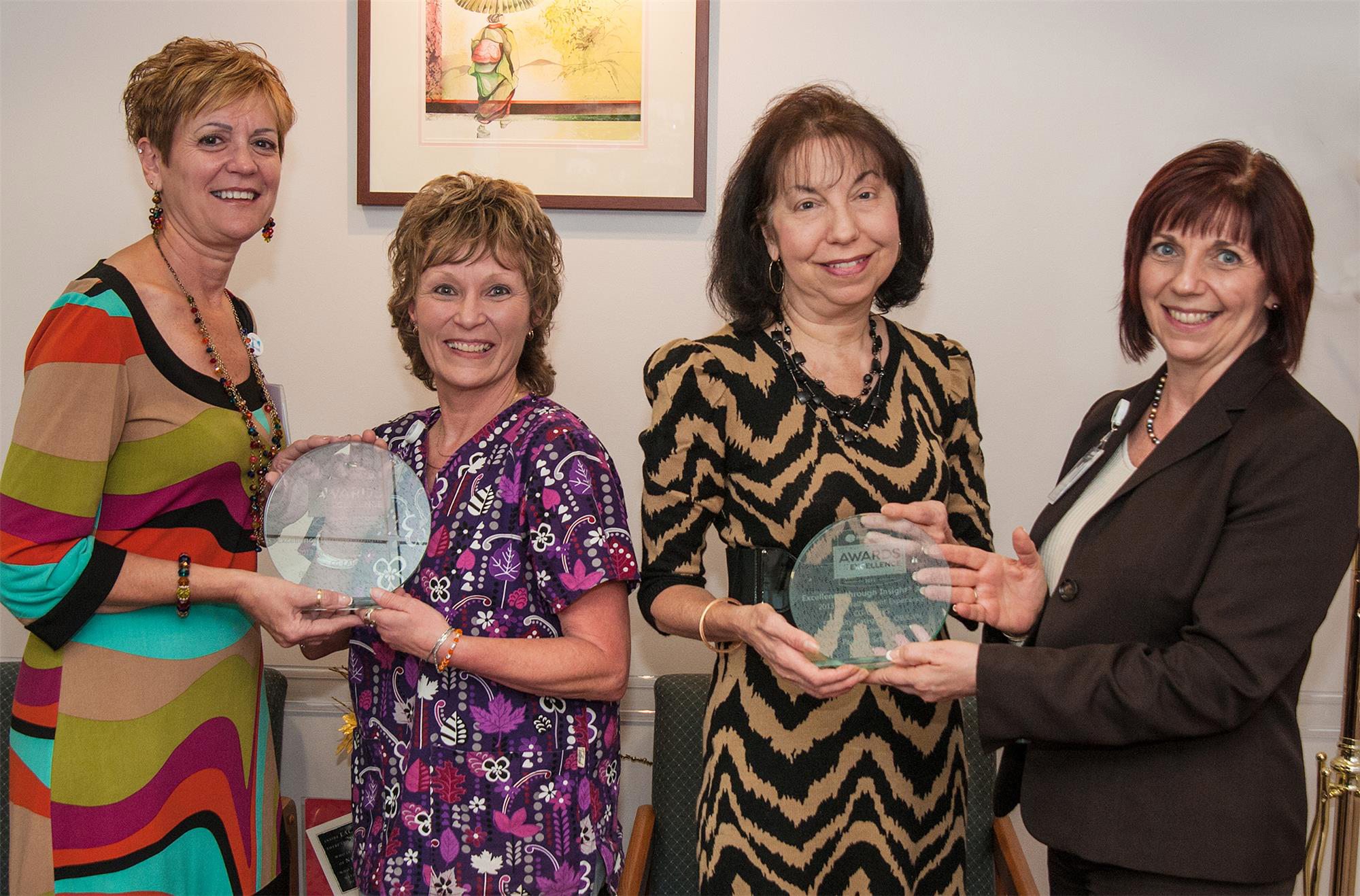Receiving the award were Christine Garner, Rene Seduski, Paulette Schreiber and Rose Campbell, hospital president.